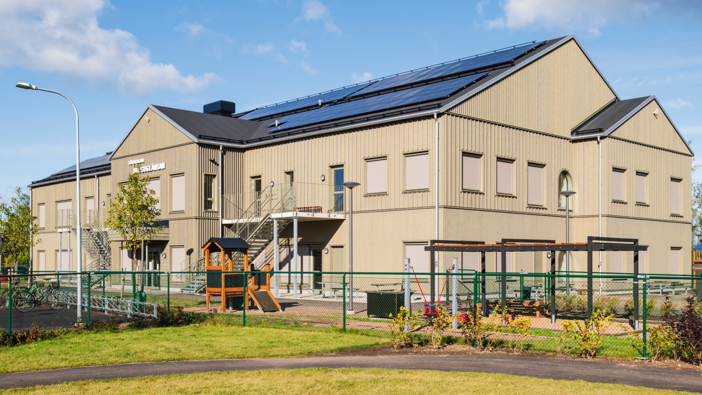 Fasad av grönpigmenterad ThermoWood