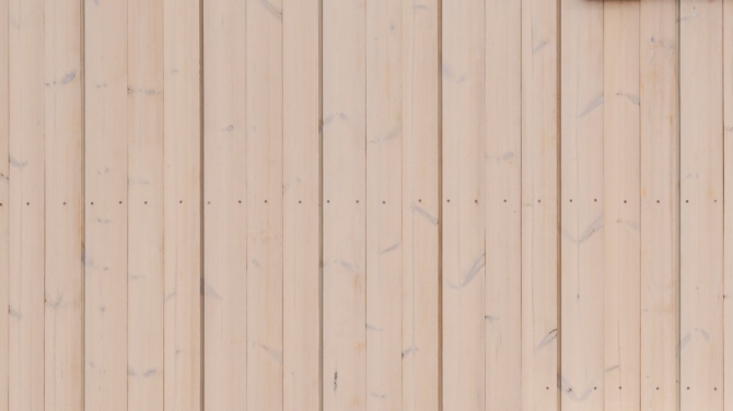 Fönster tillsammans med panel av ThermoWood BT Pigment Silver